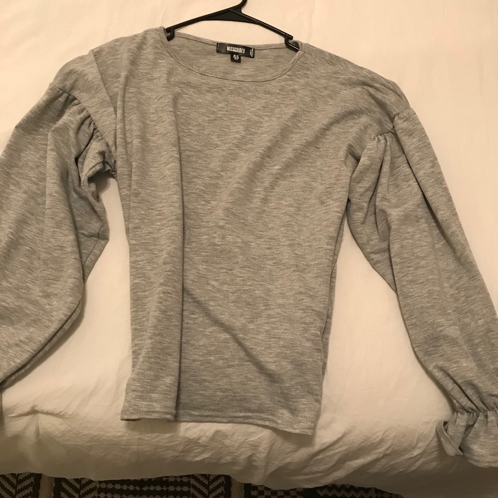 Grey statement sleeve top.